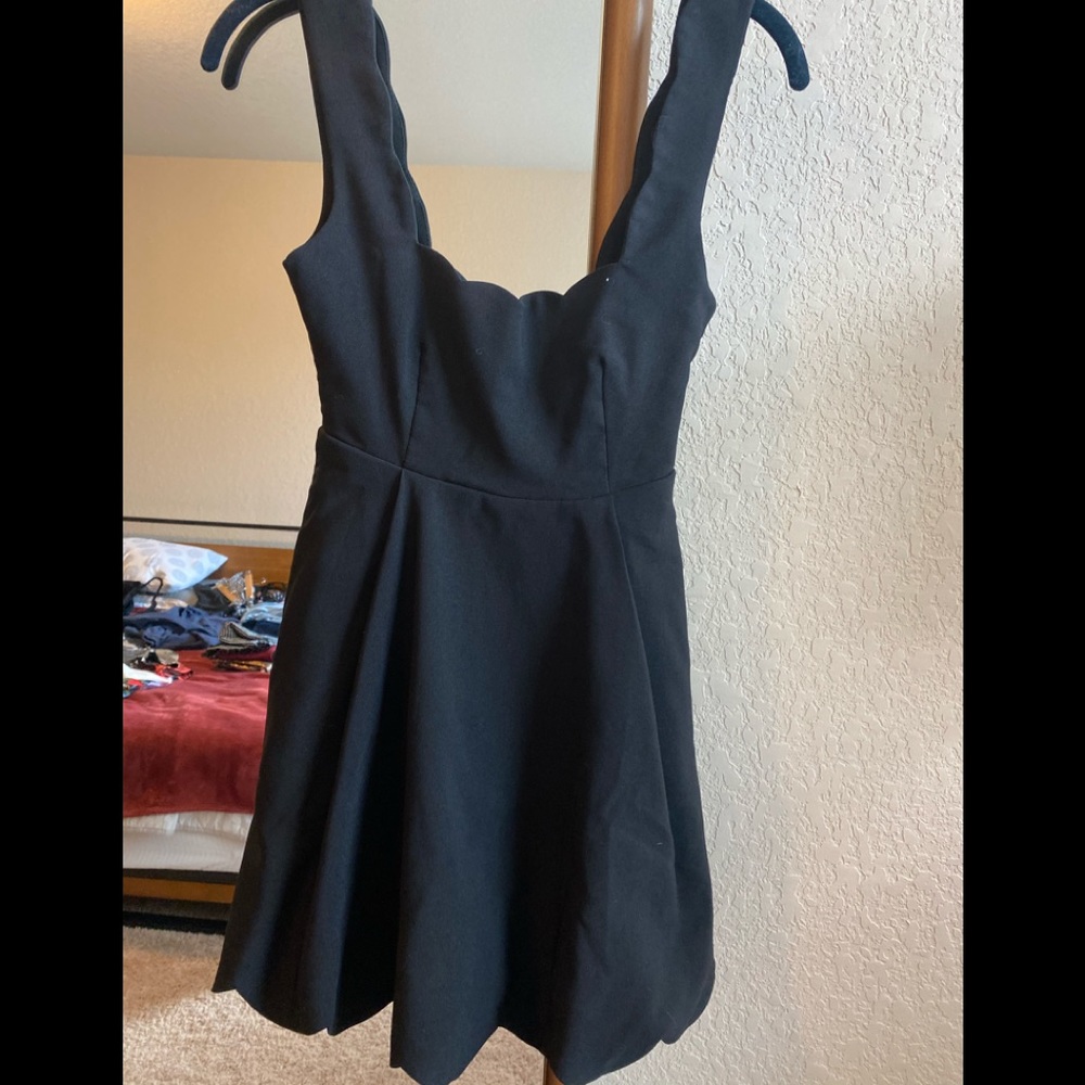 Black dress with hem details